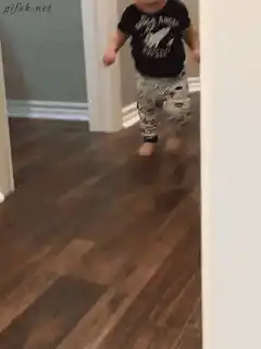 Toddler walking in hallway