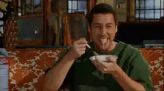 Adam Sandler eating cereal with milk mustache