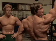 Arnold Schwarzenegger flexing back muscles