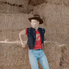 Boy in cowboy hat dancing