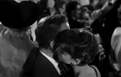 Humphrey Bogart and Audrey Hepburn dancing