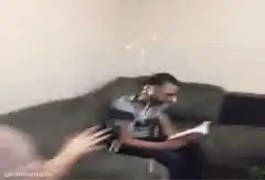 Man throws Christmas tree at person