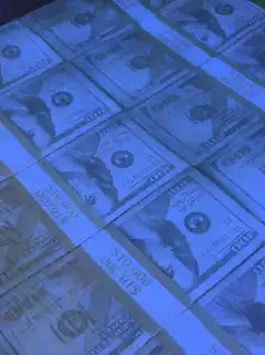 stacks of hundred dollar bills