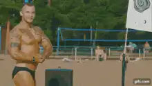 Beach bodybuilder flexes then skinny guy flexes