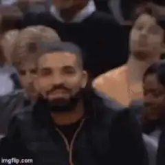 Drake pointing and smiling