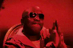 Tupac nodding and smiling