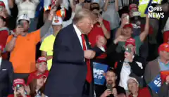 Donald Trump fist pumping at rally