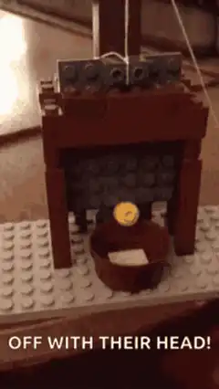 Lego guillotine drops on head