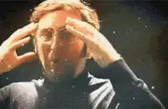 John Lennon explodes into particles