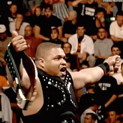 Kurt Angle screaming with championship belt