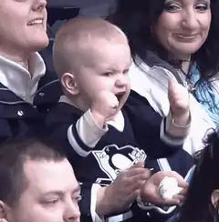 Baby cheering in Penguins jersey