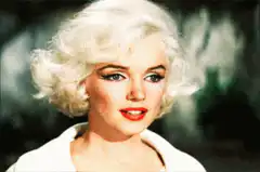 Marilyn Monroe winking and smiling