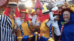 Clowns waving at the camera