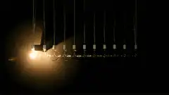 Newton's cradle with light bulbs