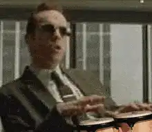 Vince Vaughn playing bongos
