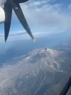 Airplane propeller over mountain