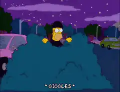 Homer Simpson sneaks past bush giggling