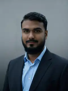 Man in suit smiling