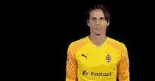Man in yellow jersey pointing