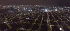Aerial view of city grid with fireworks