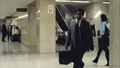 John Travolta walking in airport