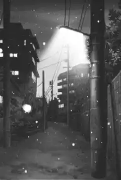 snowy night street with streetlight