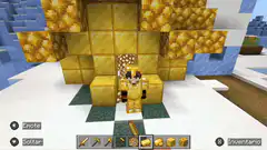Minecraft player in gold armor