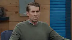 Man with cartoon eyes and tongue