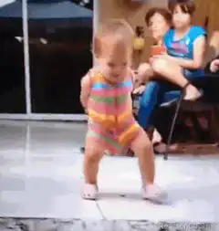 Baby dancing in colorful outfit