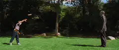 Boy throws baseball at Forrest Gump