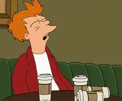 Fry yawning and drinking coffee