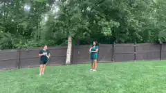 Two people blowing blue smoke