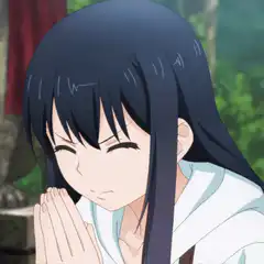 Anime girl praying with closed eyes