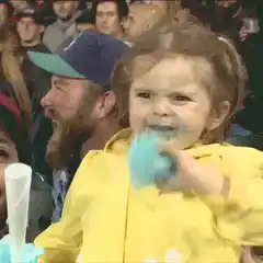Toddler eating cotton candy intense reaction