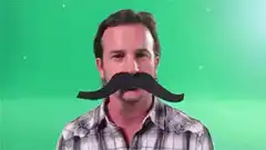Man with mustache says Bonjour
