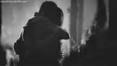 silhouette of two people hugging