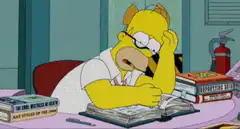Homer Simpson studying with books