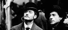 Sherlock and Watson looking around