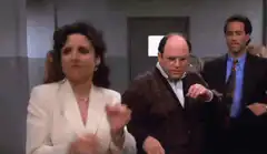 Elaine, George, and Jerry dancing