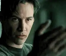 Neo holding up his hand in The Matrix