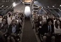 Airplane movie don't panic sign
