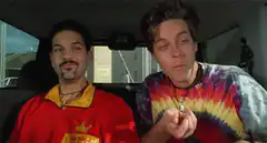 Dude and Leonard eating in the car