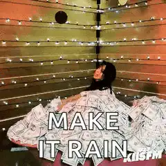 Woman throwing money in the air