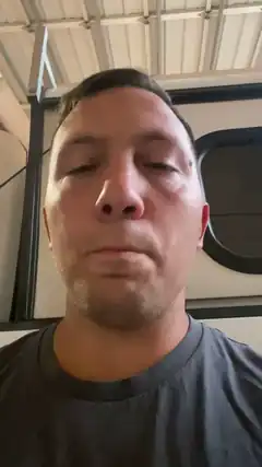 man with eyes closed in rv