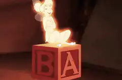 Tinker Bell falls off alphabet blocks