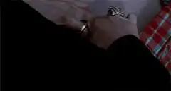 Man rips open shirt to reveal chest wound