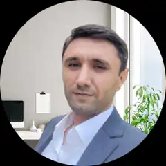 Man in suit office background