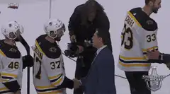 Bobby Orr shakes hands with hockey players
