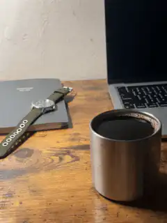 Coffee cup on wooden desk