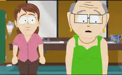Older woman adjusting her green top